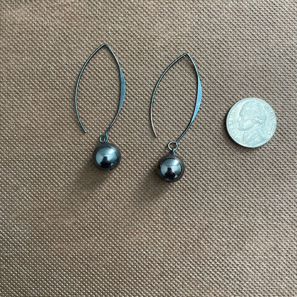 The Limited Dangle Earrings